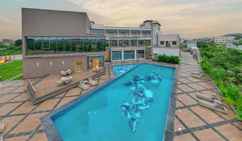 Midday Renewal Package poolside at Prestige Orchards